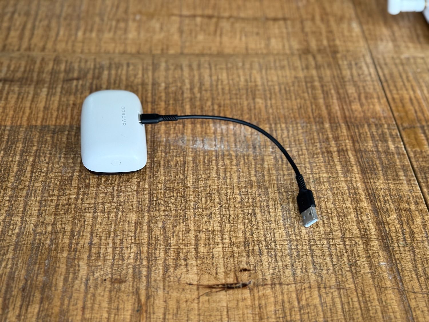 Battery dock charging on its cable